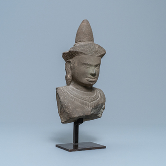 A grey sandstone bust of vishnu, Cambodia, Khmer, Angkor Wat period, 12th C.