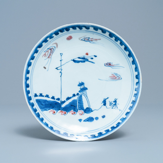 A Chinese blue, white and copper red plate, Ming
