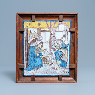 A rectangular polychrome Lille faience 'Adoration of the shepherds' plaque, France, 1st quarter 19th C.