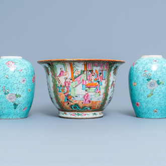 A Chinese Canton famille rose jardinière and a pair of turquoise-ground jars, 19th C.