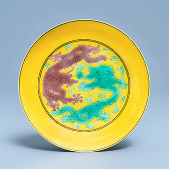 A Chinese yellow-ground green and aubergine 'dragon' dish, Guangxu mark and of the period
