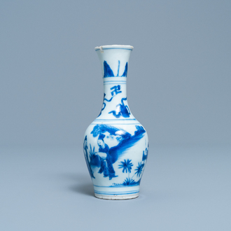 A Chinese blue and white bottle vase with figures in a landscape, Transitional period