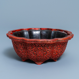 A Chinese carved cinnabar lacquer jardinière, Yongzheng/Qianlong