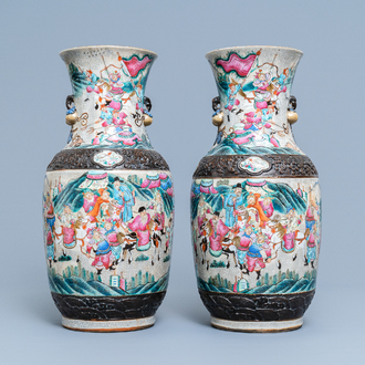 A pair of Chinese Nanking famille rose crackle-glazed 'warrior' vases, 19th C.
