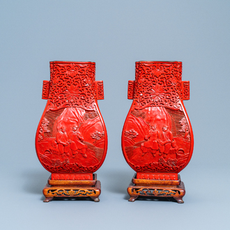 A pair of Chinese cinnabar lacquer 'Cultural Revolution' vases, 20th C.