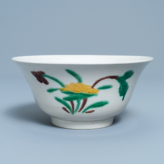 A Chinese verte biscuit 'brinjal' bowl with floral design, Kangxi