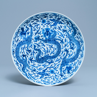 A Chinese blue and white 'dragon' dish, Kangxi mark and of the period