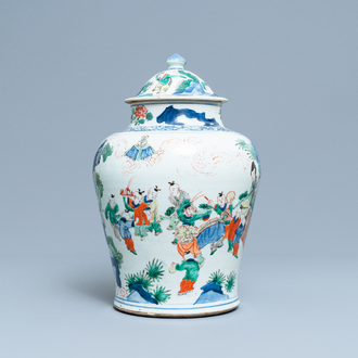 A Chinese wucai 'playing boys' vase and cover, Transitional period
