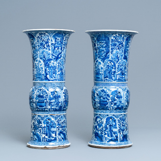 A pair of large Chinese blue and white 'Long Eliza' beaker vases, Kangxi