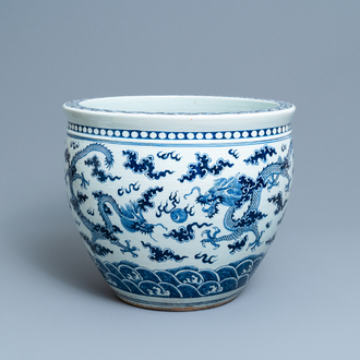 A Chinese blue and white 'dragon' fish bowl, 19th C.