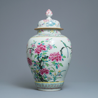 A large Chinese famille rose vase and cover with a bird on blossoming branches, Yongzheng
