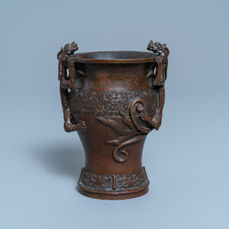 A Chinese dragon-handled bronze vase, Ming