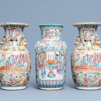 A pair of Chinese Canton famille rose vases and a single vase, 19th C.