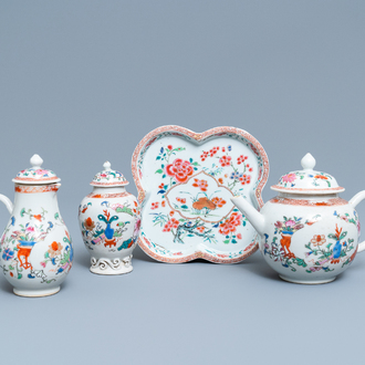 A Chinese famille rose teapot, tea caddy, milk jug and tray, Qianlong