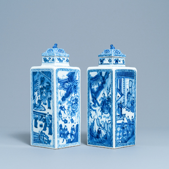 A pair of Chinese blue and white square vases and covers, Kangxi