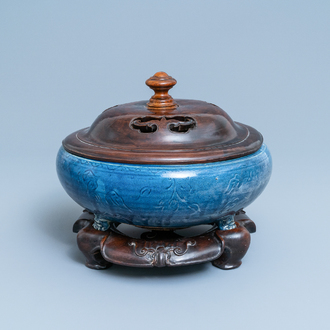 A Chinese monochrome blue censer with incised floral design, Ming