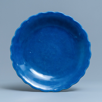 A Chinese monochrome blue lobed dish, Qianlong mark and of the period