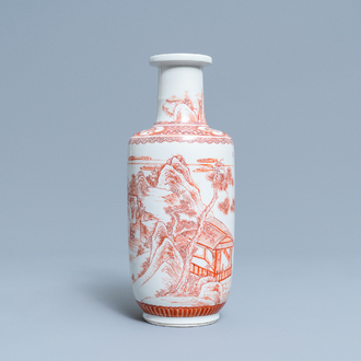Un vase de forme rouleau en porcelaine de Chine à décor d'un paysage en rouge de fer, Kangxi
