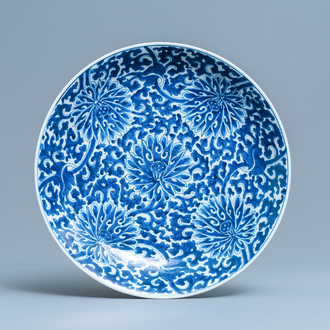 A Chinese blue and white 'lotus scroll' charger, Kangxi