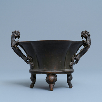 A Chinese chilong-handled bronze censer, Xuande mark, 18th C.