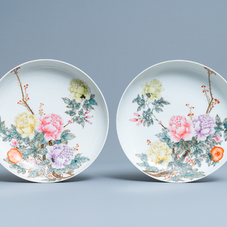A pair of Chinese famille rose plates with floral arrangements, Qianlong mark, Republic