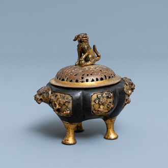 A Chinese lacquered and parcel-gilt bronze tripod censer and cover, Ming