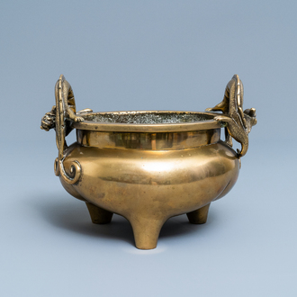 A Chinese bronze chilong-handled tripod censer, seal mark, 17/18th C.