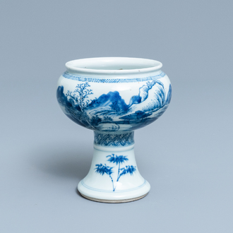 A Chinese blue and white stem cup with a continuous landscape scene, Kangxi/Yongzheng