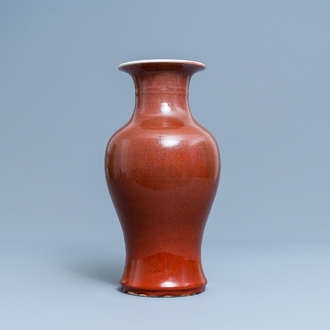 A Chinese monochrome sang de boeuf vase, 19th C.