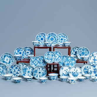 Twenty Chinese blue and white cups and twenty-four saucers, Kangxi