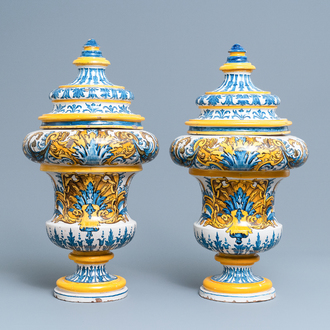 An important pair of large inscribed Italian maiolica drug jars and covers, Naples, dated 1724