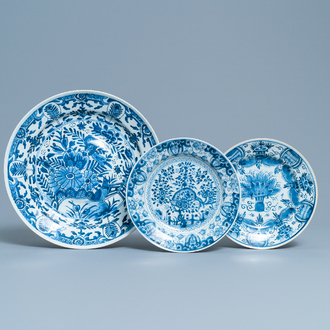 A Chinese blue and white dish and two plates after Dutch Delft examples, Kangxi/Qianlong