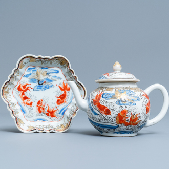 A Chinese 'crane and carps' teapot on stand, Yongzheng