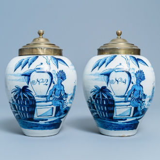 A pair of Dutch Delft blue and white tobacco jars with indians, 18th C.