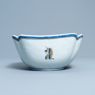 A Chinese blue, white and gilt English market bowl with the arms of Gale, Qianlong