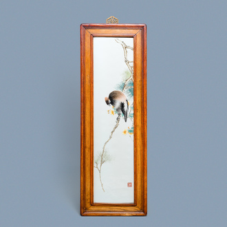 A large Chinese rectangular plaque with a bird on a blossoming branch, seal mark, Republic