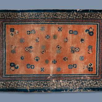 A rectangular Chinese hand-knotted wool carpet with brocade balls, 19th C.