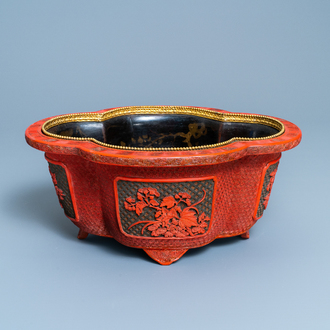 A Chinese quatrefoil jardinière in red and black lacquer, Qianlong