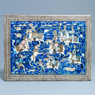 A large rectangular polychrome 'hunting scene' tile, Qajar, Iran, 19th C.