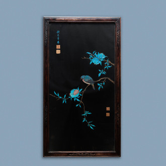 A Chinese black silk-ground panel with a kingfisher feather collage of a bird with pomegranates, 18/19th C.