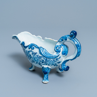 A Dutch Delft blue and white sauce boat, 18th C.