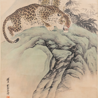 Liu Kuiling (China, 1885-1967), ink and colour on paper: 'Two leopards in a mountain landscape'