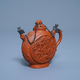 Een Chinese dubbelwandige opengewerkte Yixing steengoed theepot met zilveren montuur, Kangxi