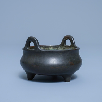 A Chinese bronze tripod censer, Xuande mark, 17/18th C.