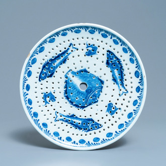 A Dutch Delft blue and white fish strainer, 18th C.