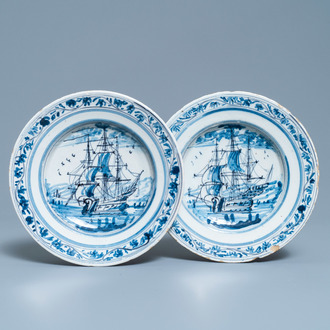 A pair of Dutch Delft blue and white plates with threemasters, 18th C.