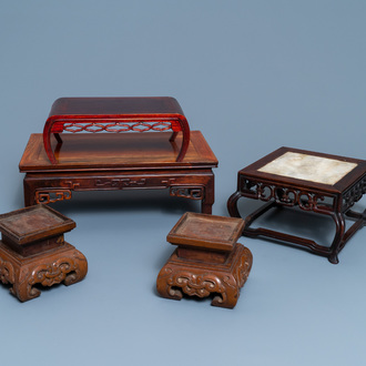 Five Chinese wooden stands, 19/20th C.