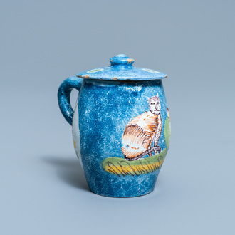 A polychrome Brussels faience mustard jar and cover with a cat, 18th C.