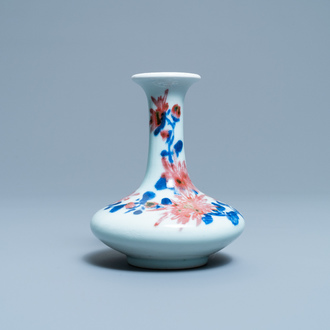 A small Chinese blue, white and underglaze red bottle vase with floral design, Republic