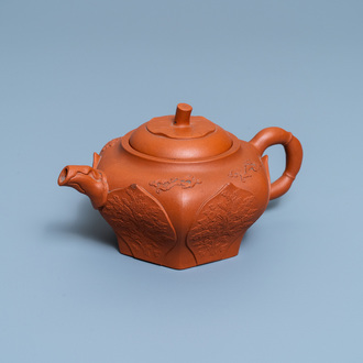 A Chinese Yixing stoneware lotus-shaped teapot and cover, Kangxi